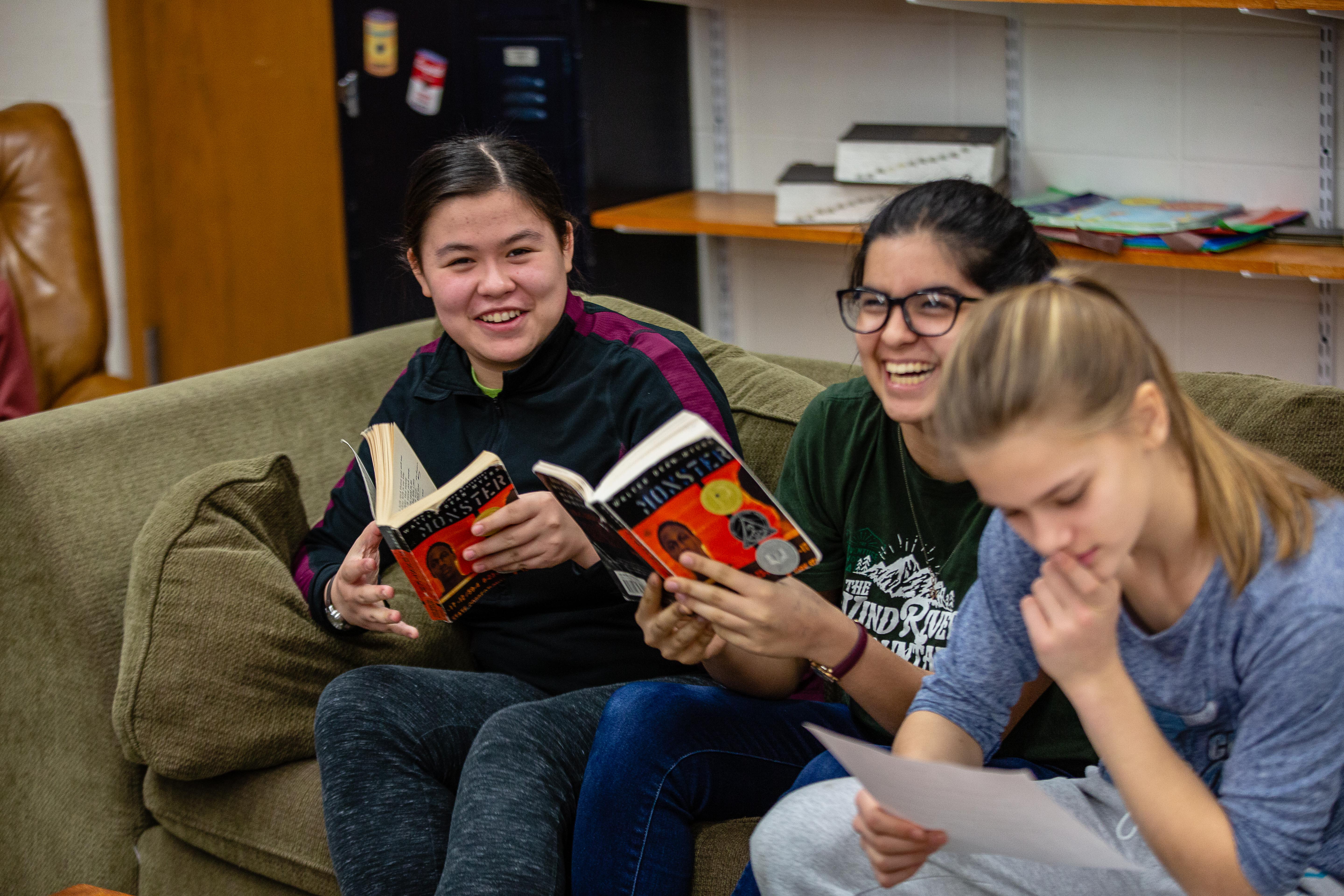 Diverse Middle School students collaborating in class