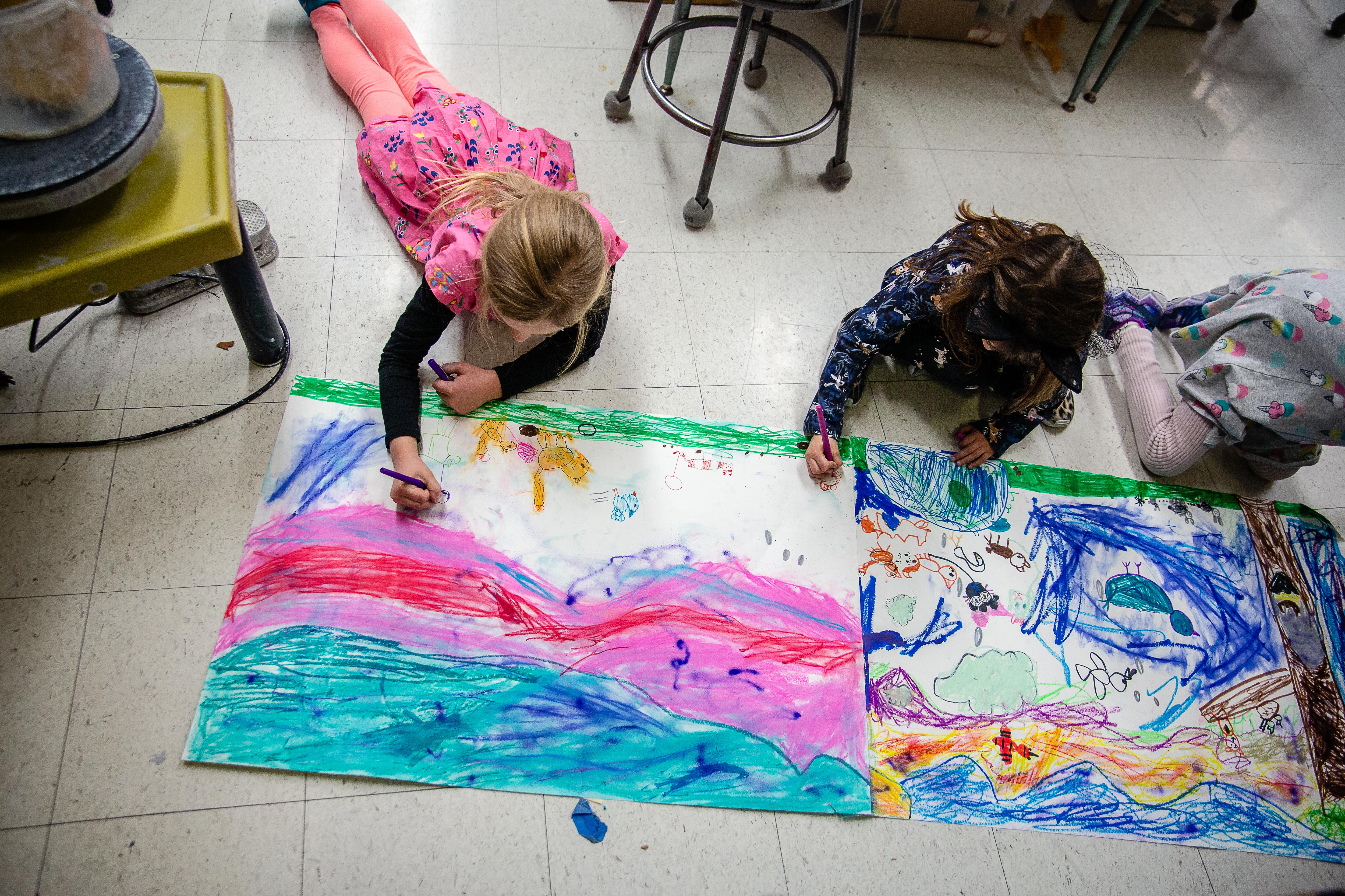 Elementary School students immersed in creative expression